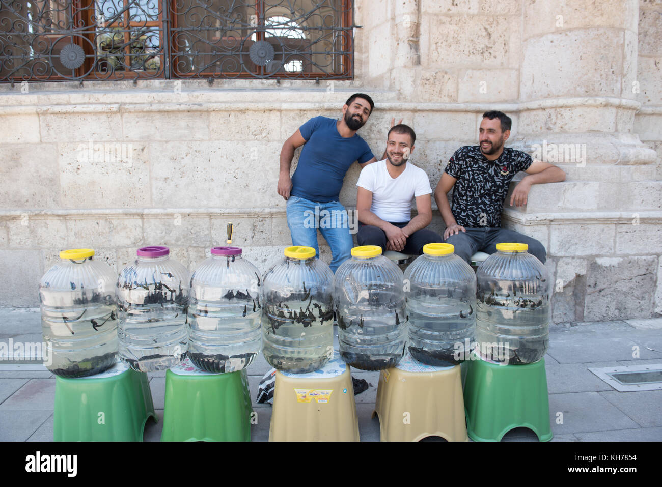 People sell Medical leeches in plastic bottles.Sucking leeches for