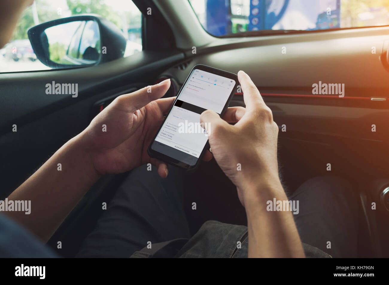 Man using phone in the car Stock Photo Alamy