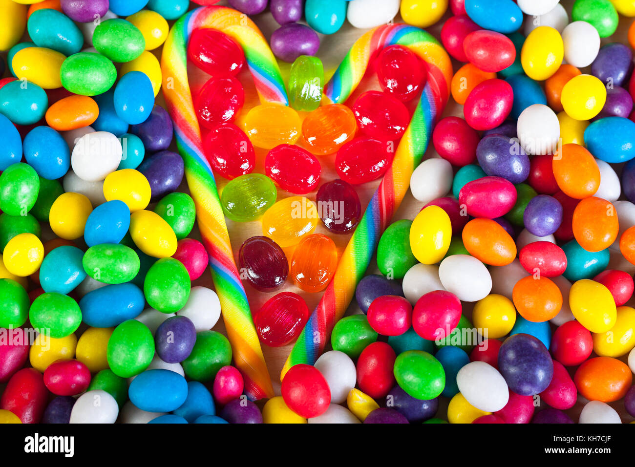 frame from heart from colorful sweets of sugar candies. background from on candies. colored sweets close up Stock Photo