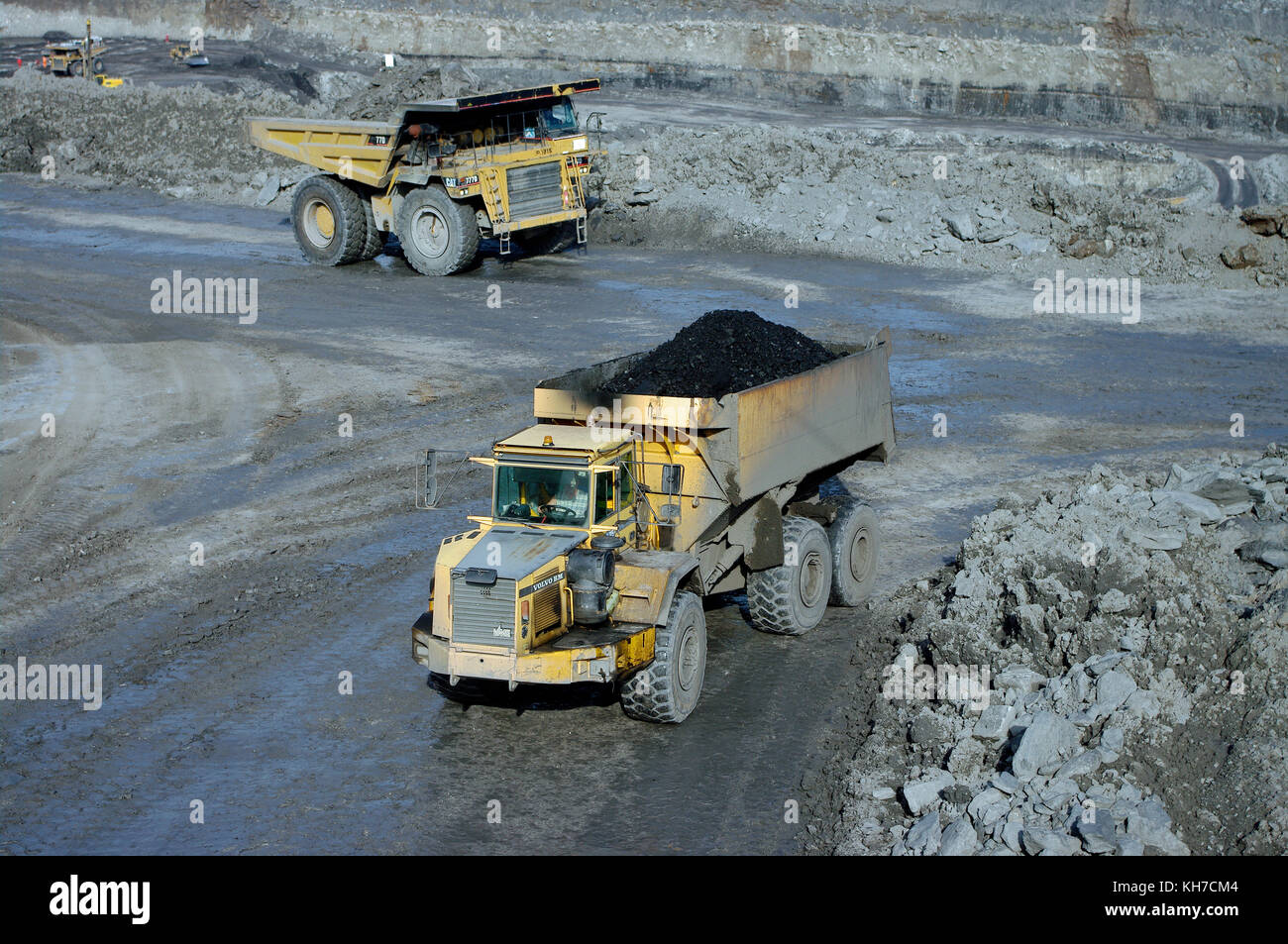 Volvo BM and CAT Dump Truck at Widdrington coal mine Stock Photo