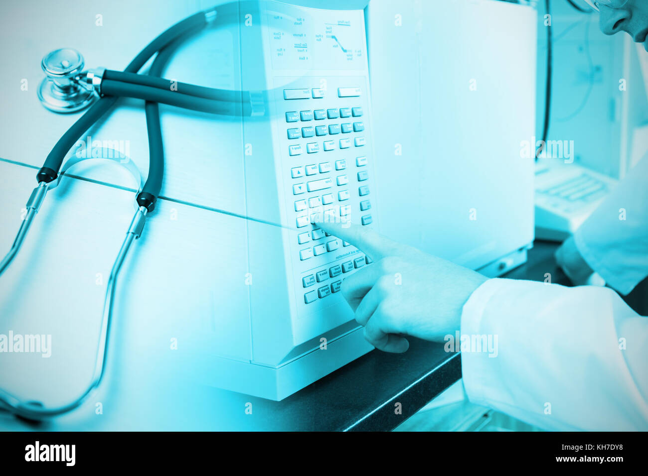 Science student using a laboratory chamber furnace in a laboratory