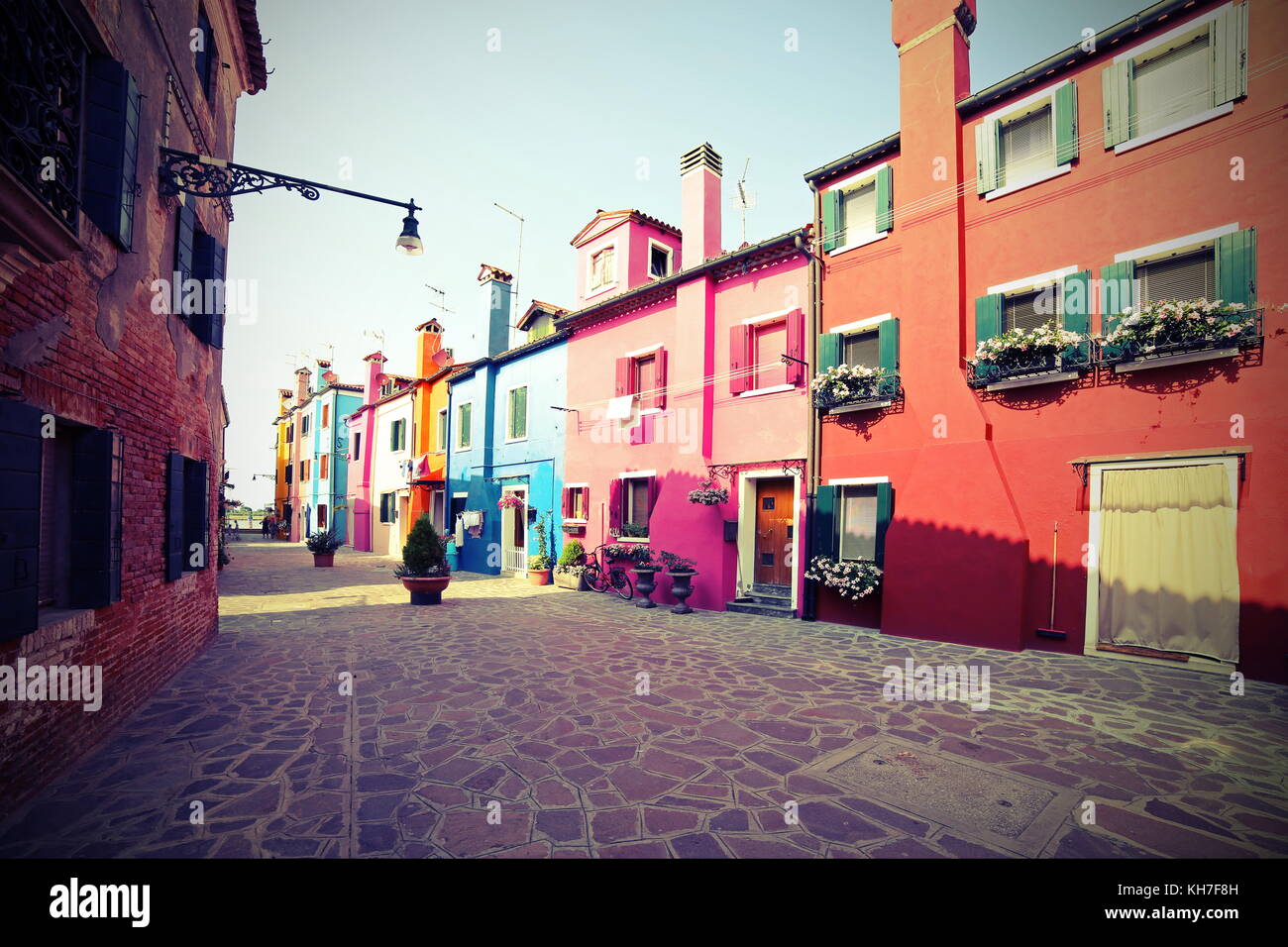 exterior of the colorful houses of the island of Burano near VENICE in Italy with vintage effect Stock Photo