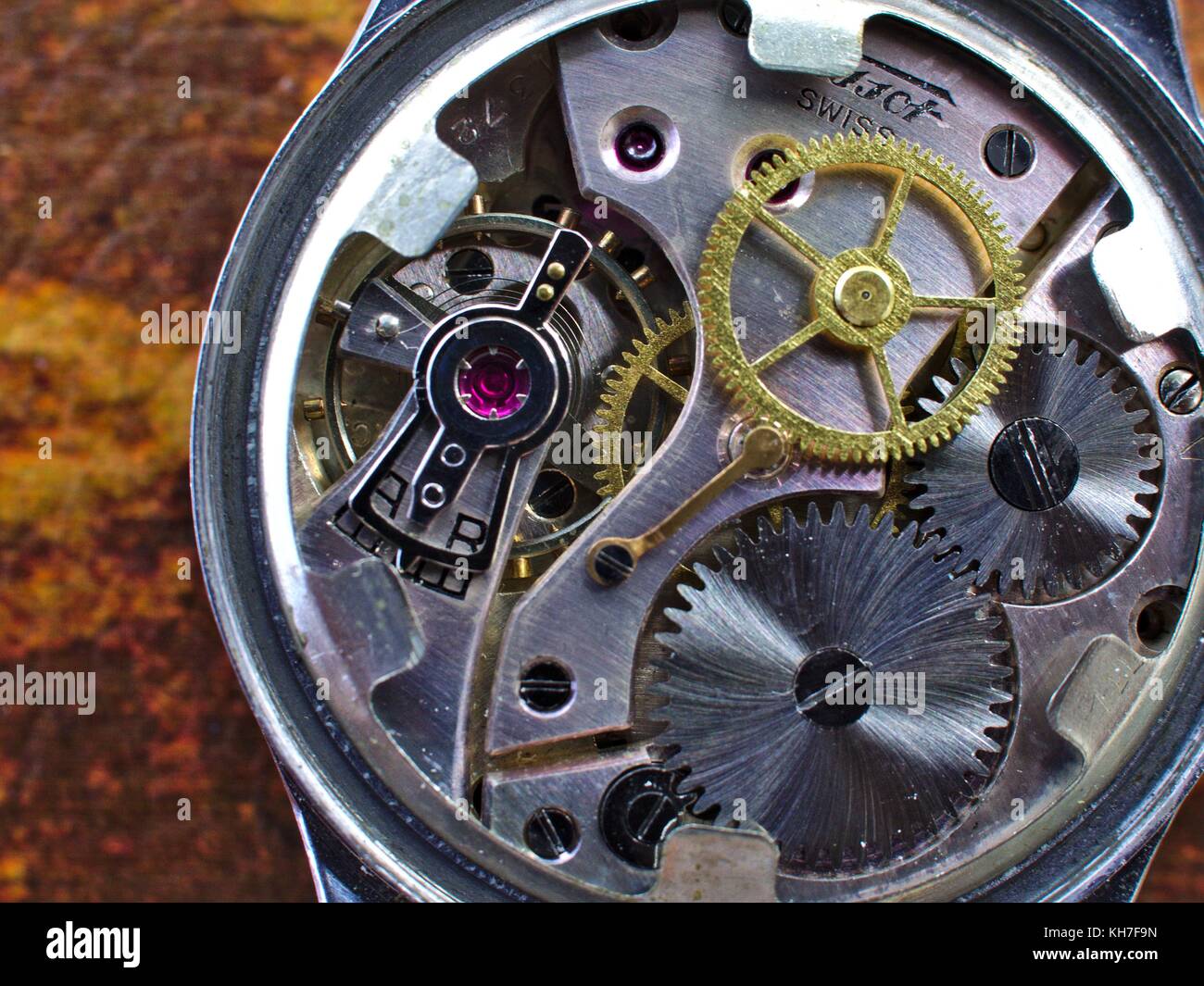 Clock mechanism of an old Swiss watch.Precision craftsmanship of real watchmakers Stock Photo