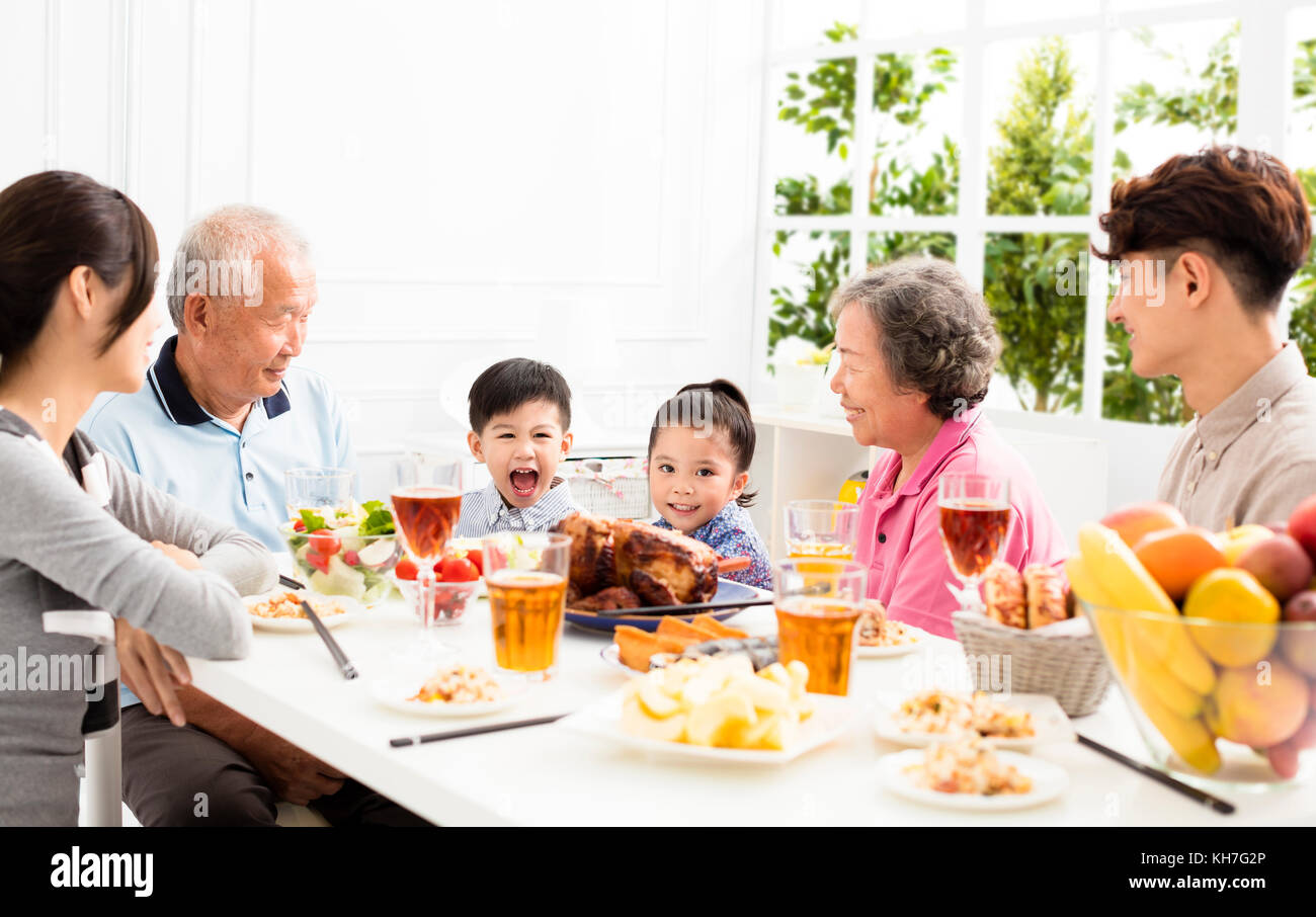 happy asian family having dinner at home Stock Photo - Alamy