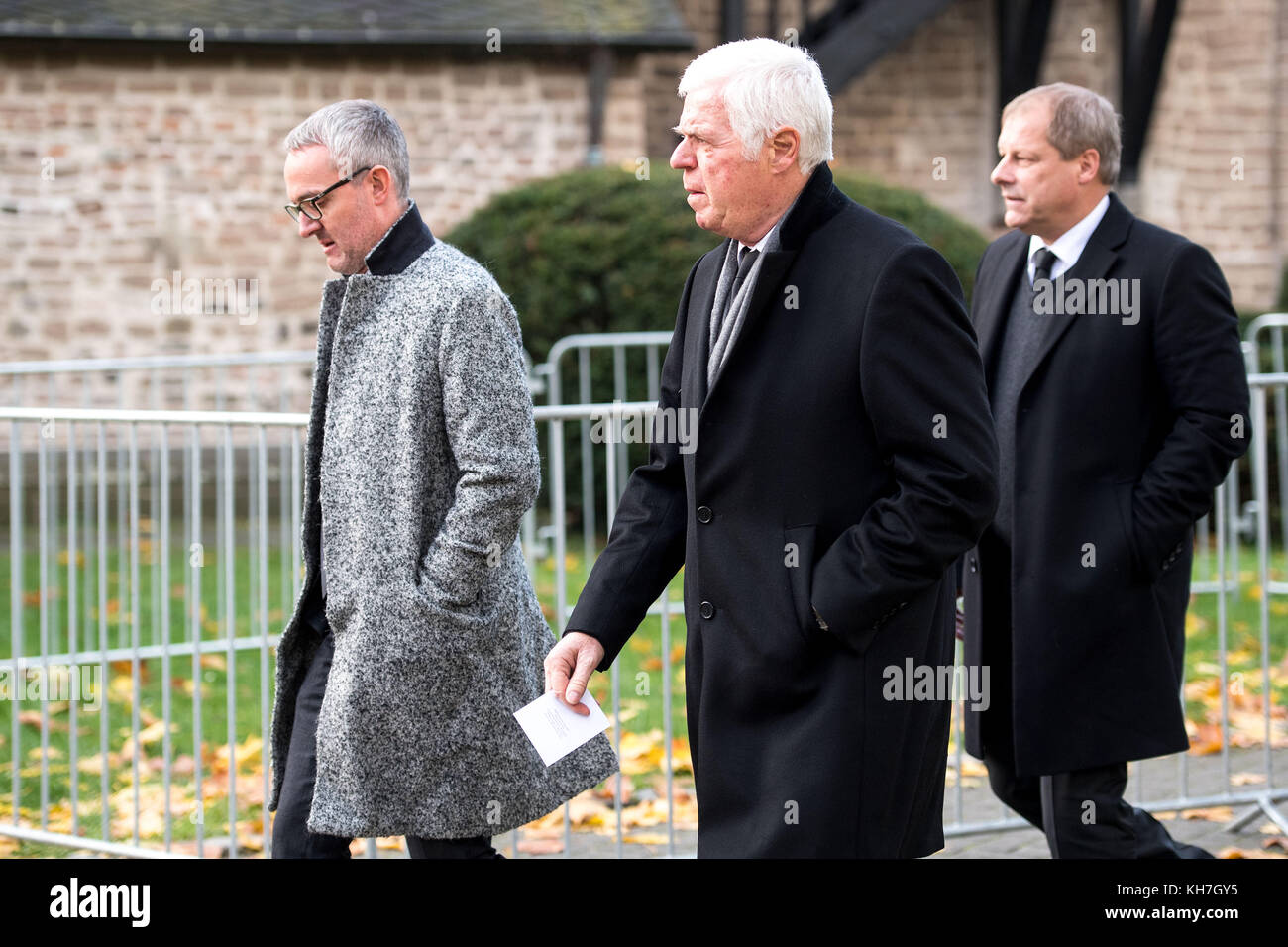 Cologne, Germany. 14th Nov, 2017. Manager of 1. FC Koeln Alexander Wehrle  (L-R), president Werner Spinner and vice president MArkus Ritterbacharrive  at the mourning ceremony of the departed former soccer player Hans