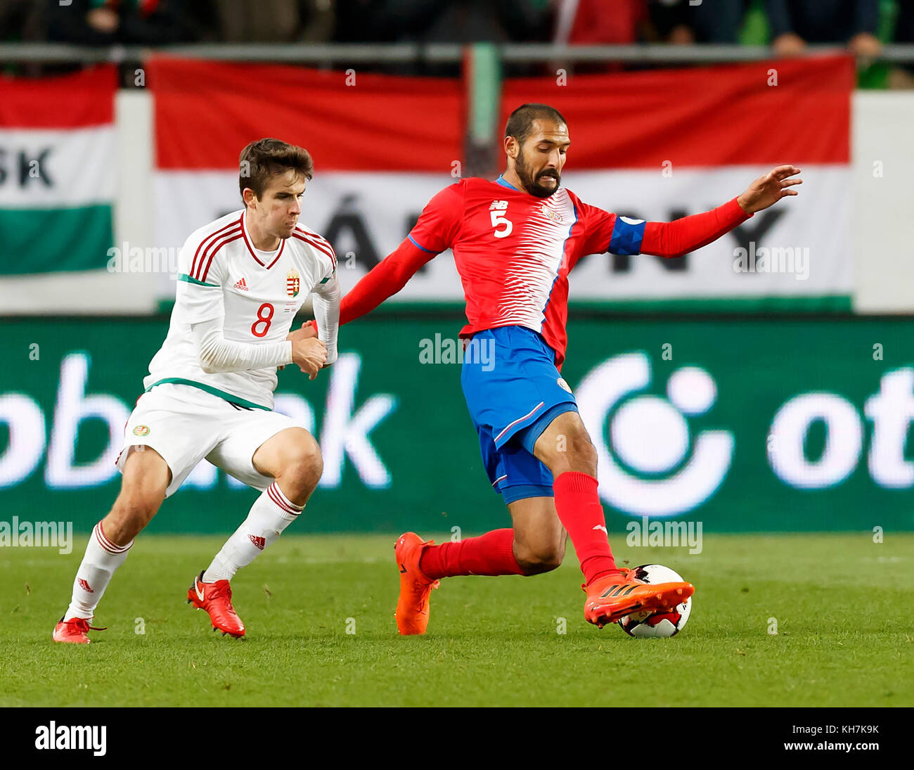 Budapest, Hungary. 14th Nov, 2017. Celso Borges #5 of Costa Rica wins the ball from Adam Nagy #8 of Hungary during the at Groupama Arena on November 14, 2017 in Budapest, Hungary. Credit: Laszlo Szirtesi/Alamy Live News Stock Photo