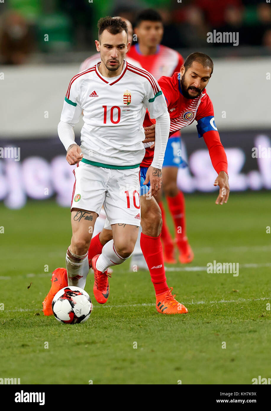 Budapest, Hungary. 14th Nov, 2017. Roland Ugrai #10 of Hungary wins the ball from Celso Borges (R) of Costa Rica during the at Groupama Arena on November 14, 2017 in Budapest, Hungary. Credit: Laszlo Szirtesi/Alamy Live News Stock Photo