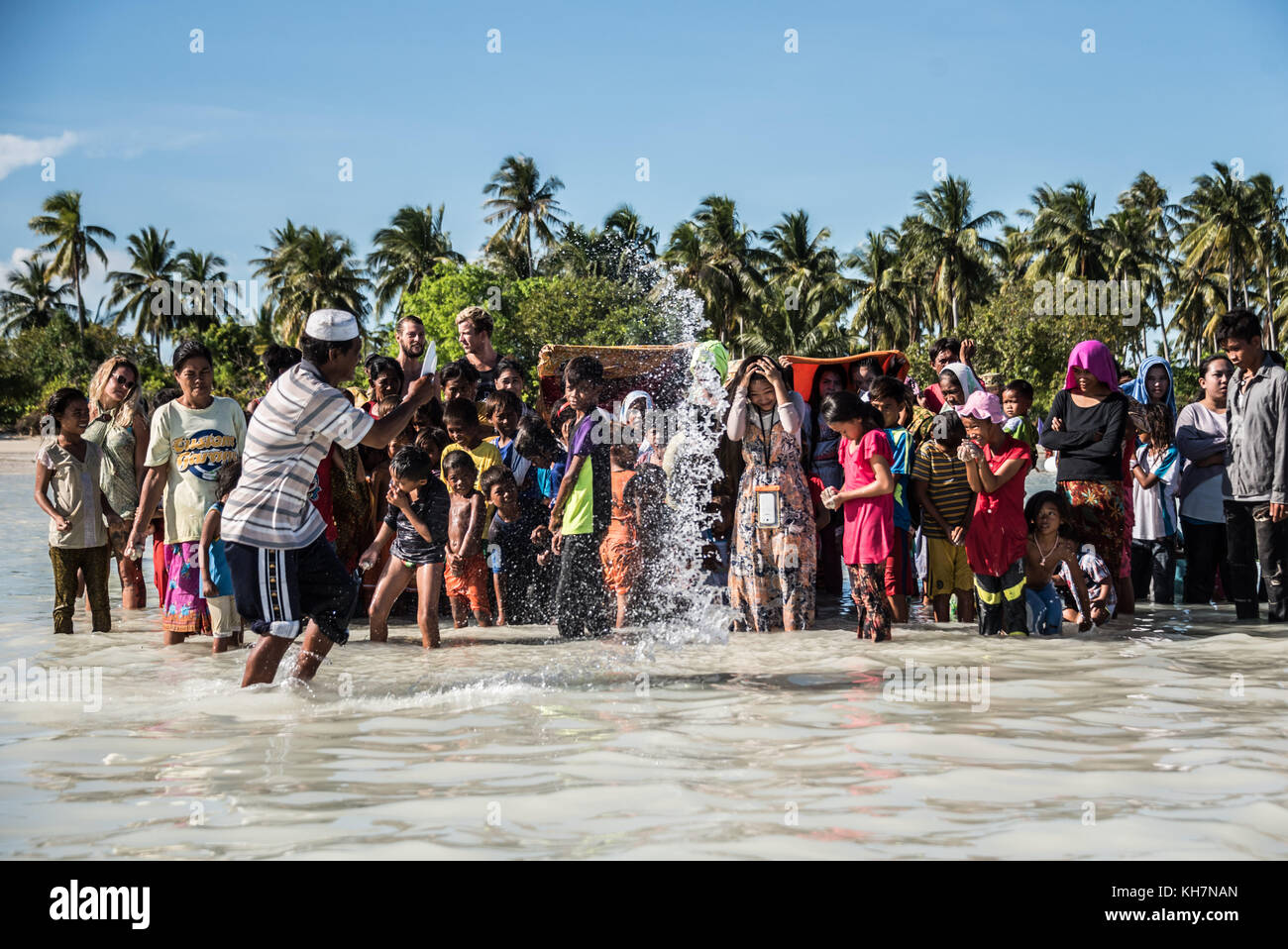 Bajau Rituals Sabah, Malaysian Borneo. 15th, November 2017. An Imam blesses members ...
