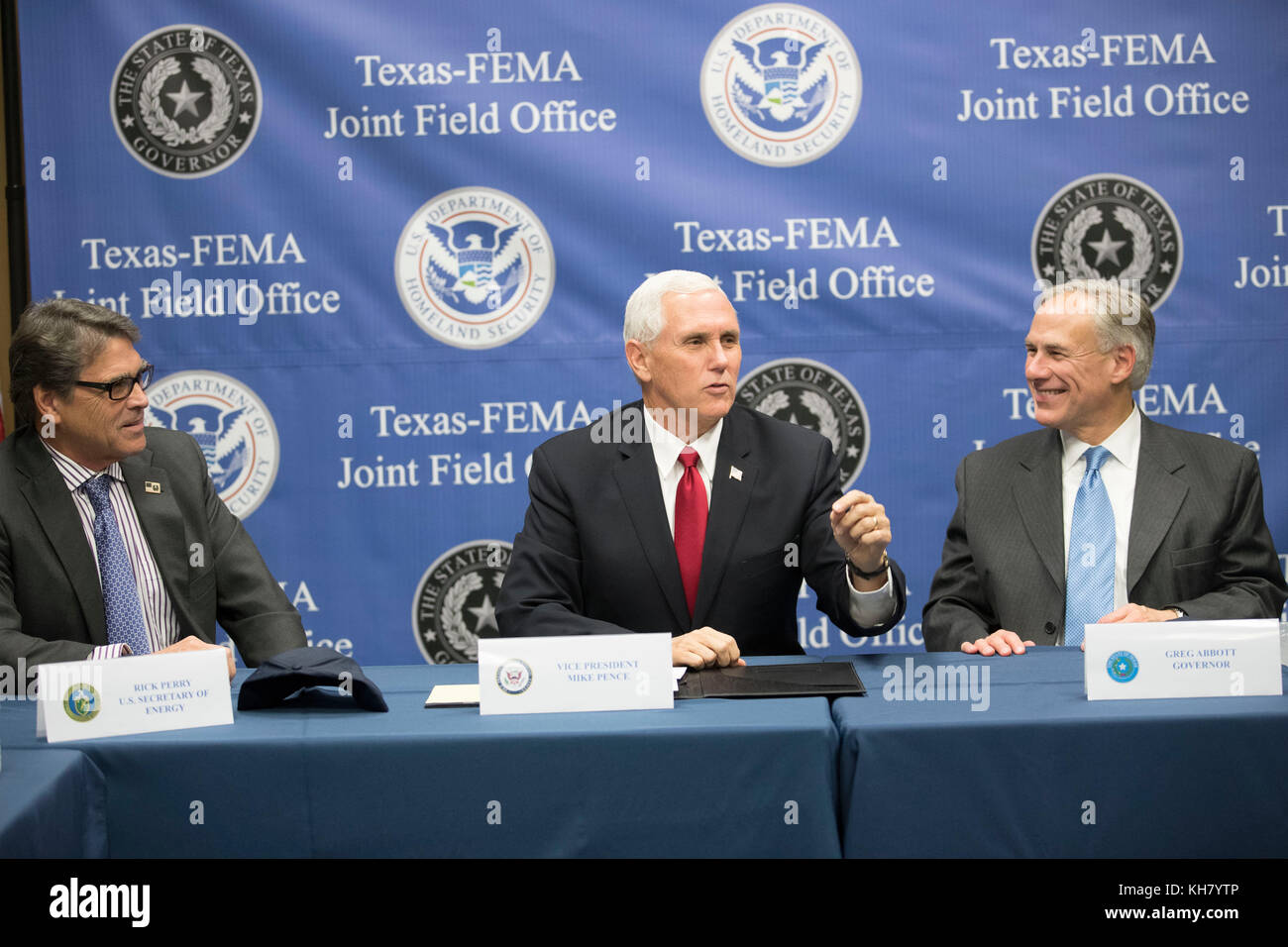 Austin, USA. 15th Nov, 2017. U.S. Vice President Mike Pence (center) visits Federal Emergency Management Agency (FEMA) Texas regional office with Energy Secy. Rick Perry (left) for a Hurricane Harvey recovery update from Texas Gov. Greg Abbott (right). Credit: Bob Daemmrich/Alamy Live News Stock Photo