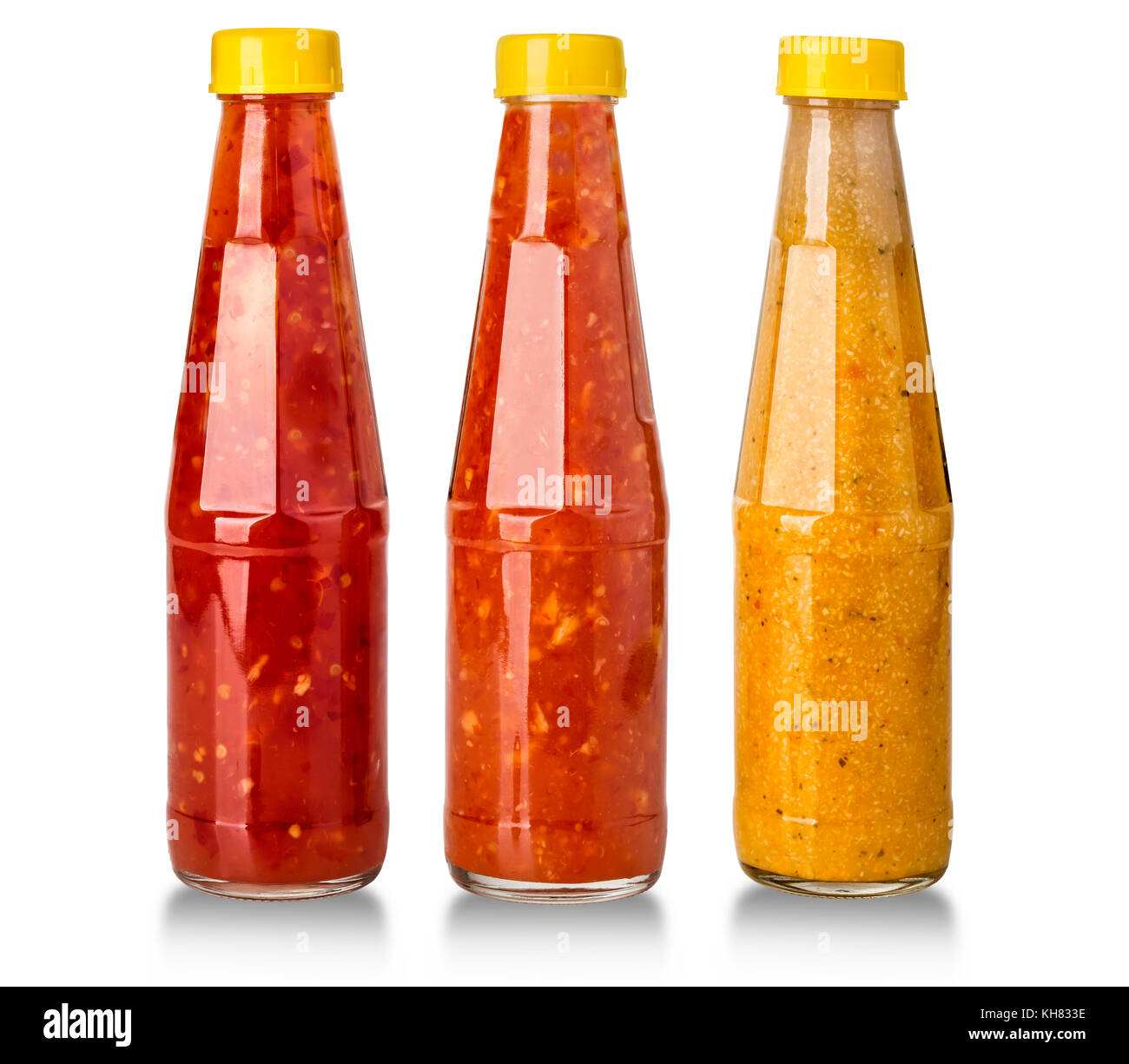 barbecue sauces in glass bottles on white background Stock Photo - Alamy