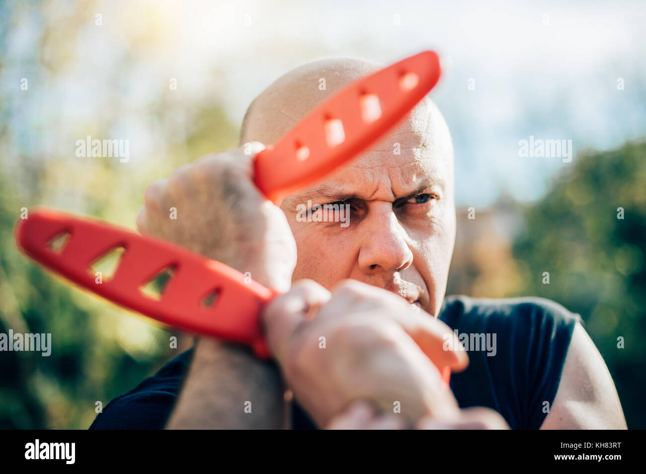 Knife vs knife fight. Kapap instructor demonstrates martial arts self