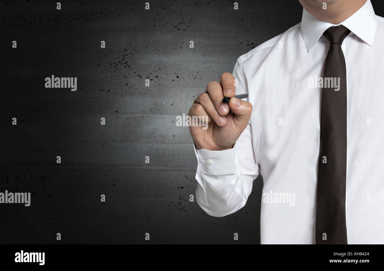 Template concept Businessman writes on screen. Stock Photo