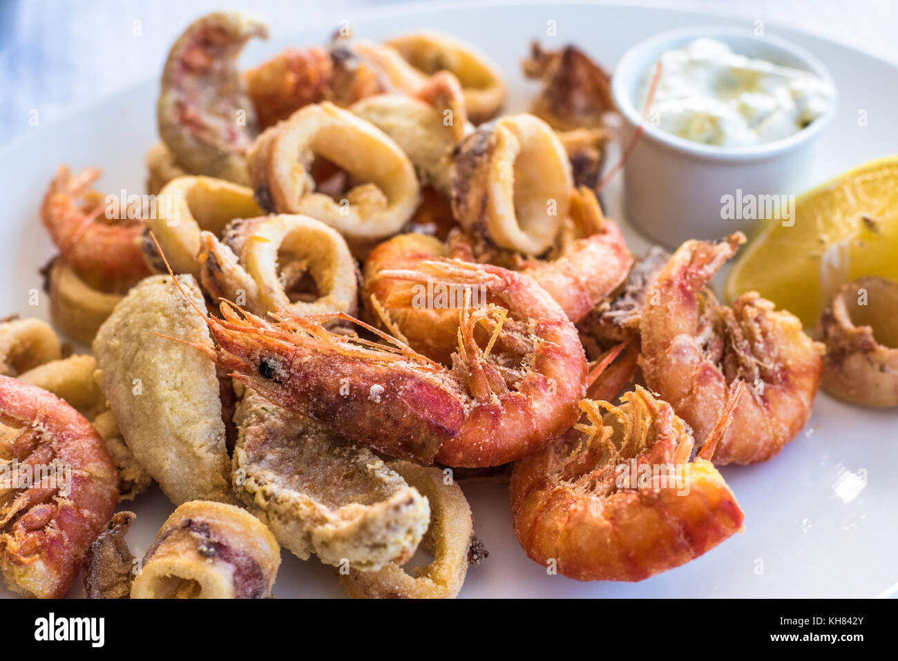 Mixed deep-fried fish, shrimp and squid platter Stock Photo