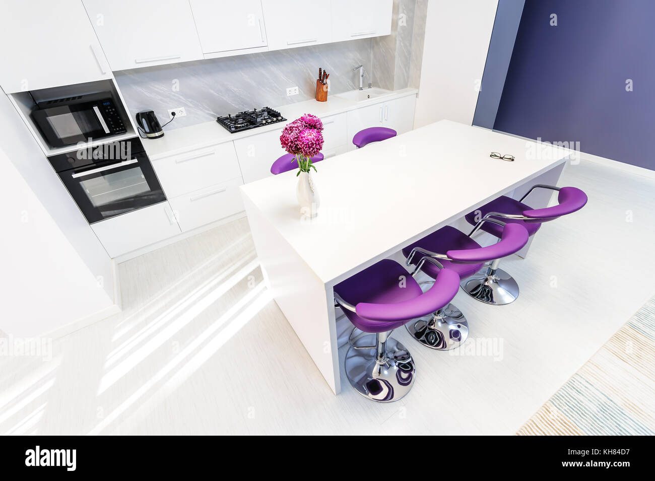 white dining table in modern kitchen Stock Photo Alamy