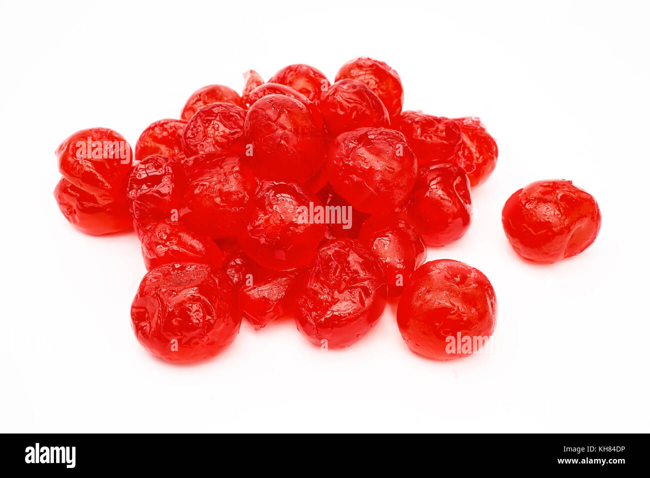 Sweet candied cherries measured for Christmas baking especially fruitcakes. Stock Photo