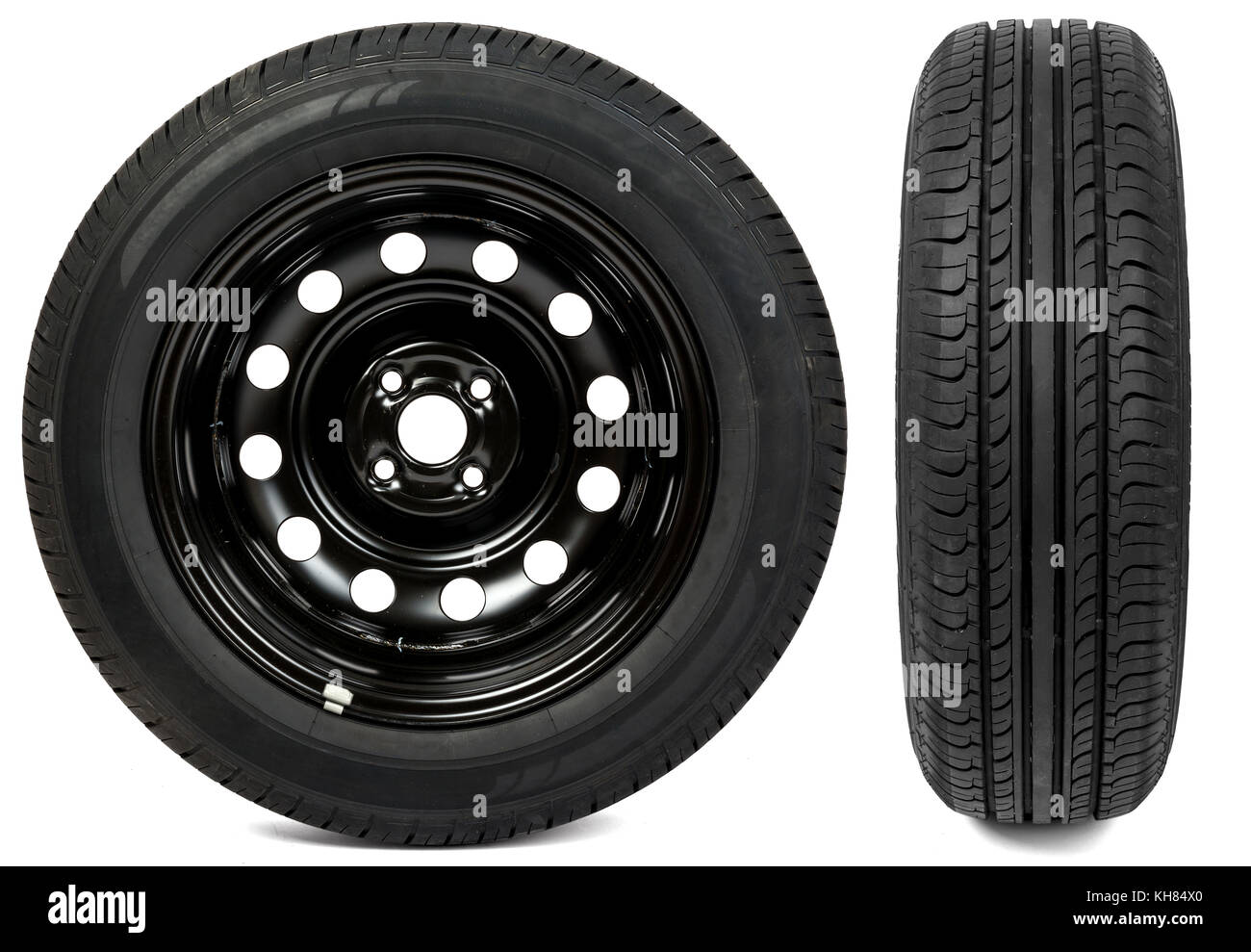 Set of two new black tyres Stock Photo - Alamy
