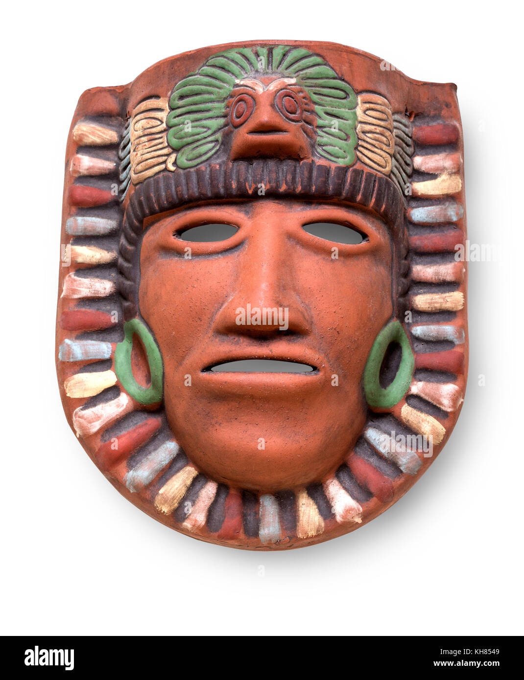 Indian Mayan Aztec ceramic painted mask with feather isolated on white with clipping path Stock Photo