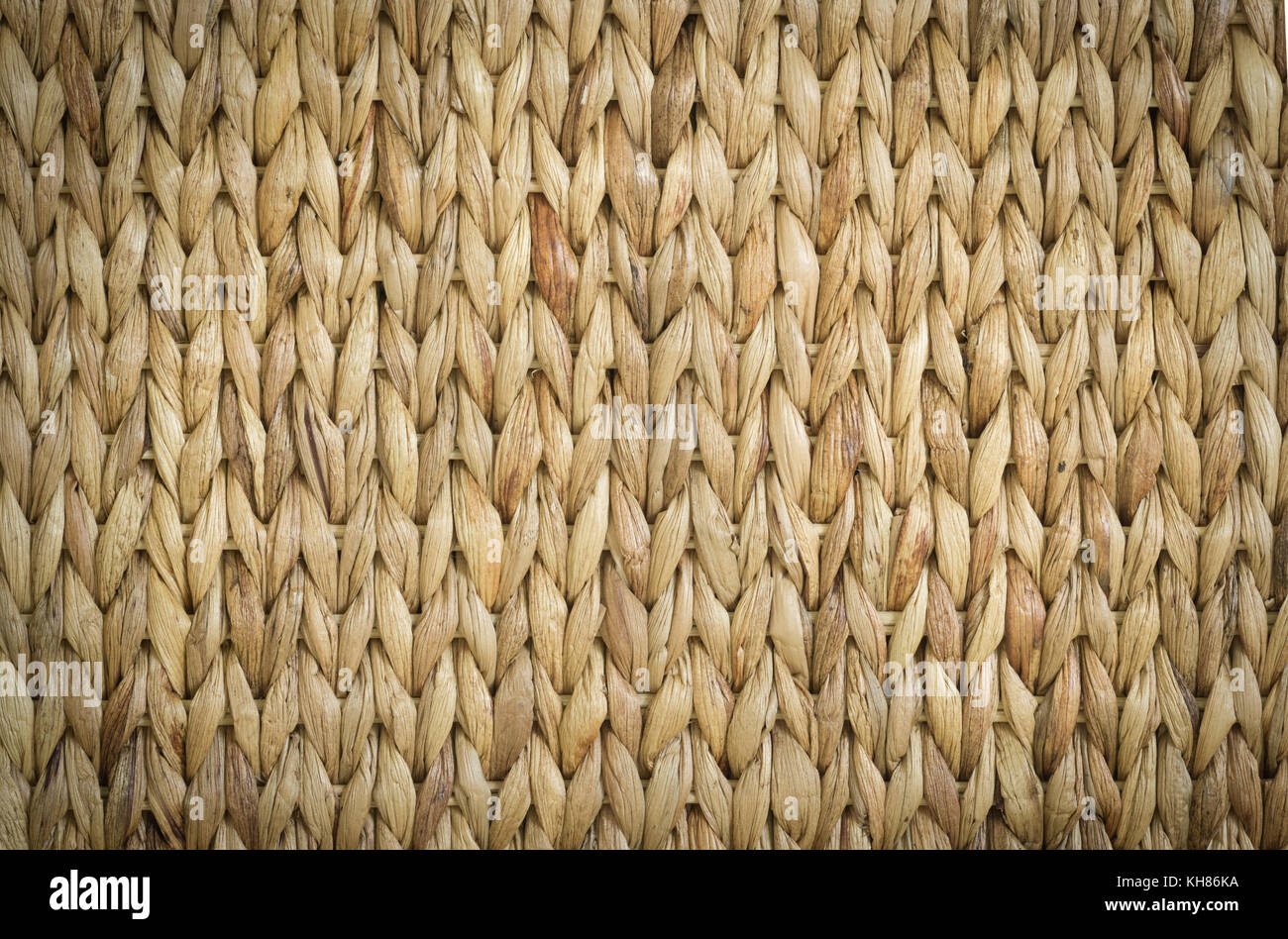 Meshwork of wooden reed wicker texture background Stock Photo