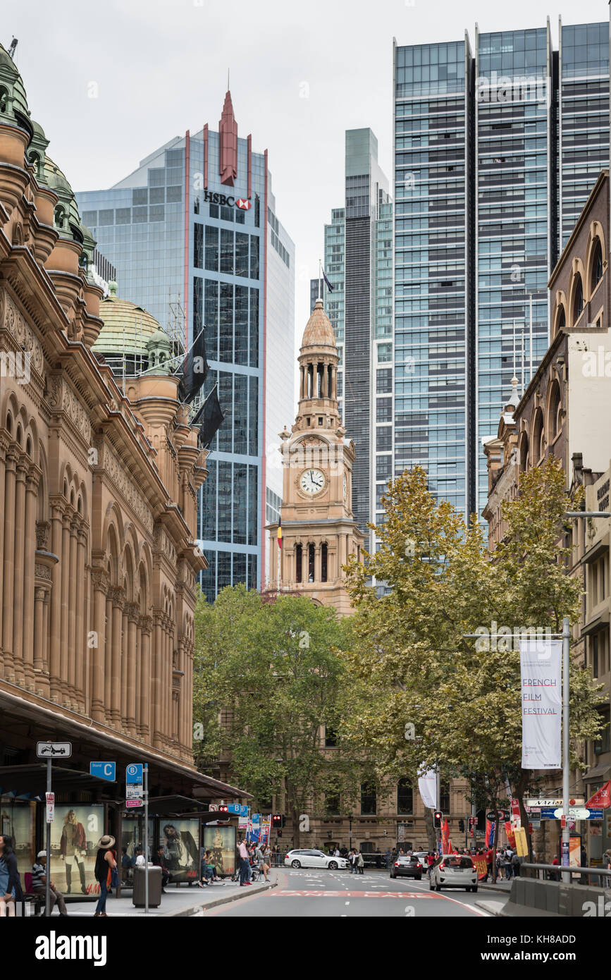 Sydney, Australia - 25, 2017: Brown stone historic monumental clock of City Hall surrounded by tall modern office buildings seen from Photo - Alamy