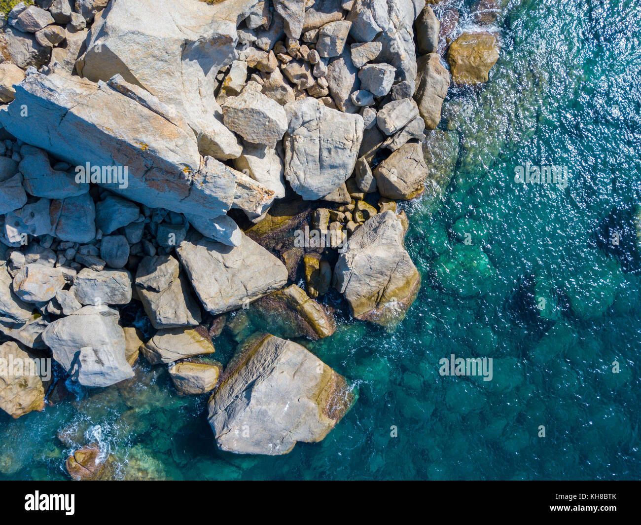 Aerial view of rocks on the sea. Overview of the seabed seen from above, transparent water Stock ...