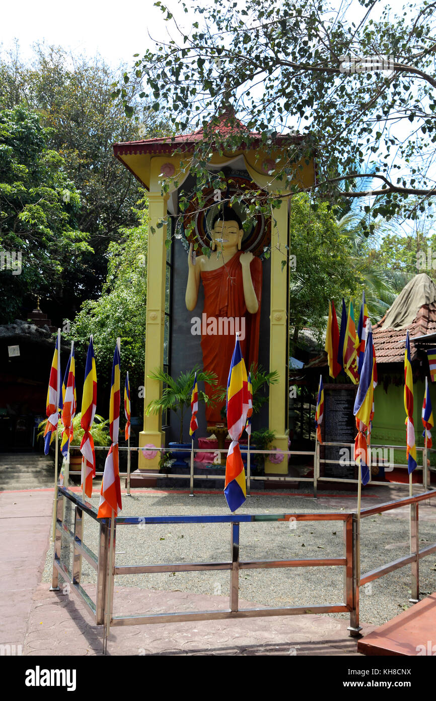 Galle Sri Lanka Rumassala Road Sri Vivekaramaya Temple Statue Of Standing Buddha Stock Photo