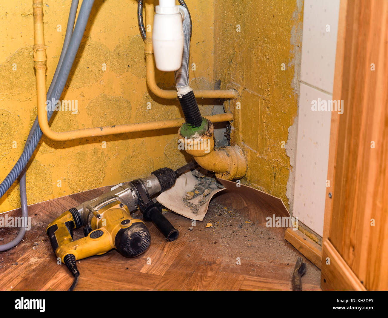 Fixing a leaking kitchen sink, indoor closeup Stock Photo Alamy