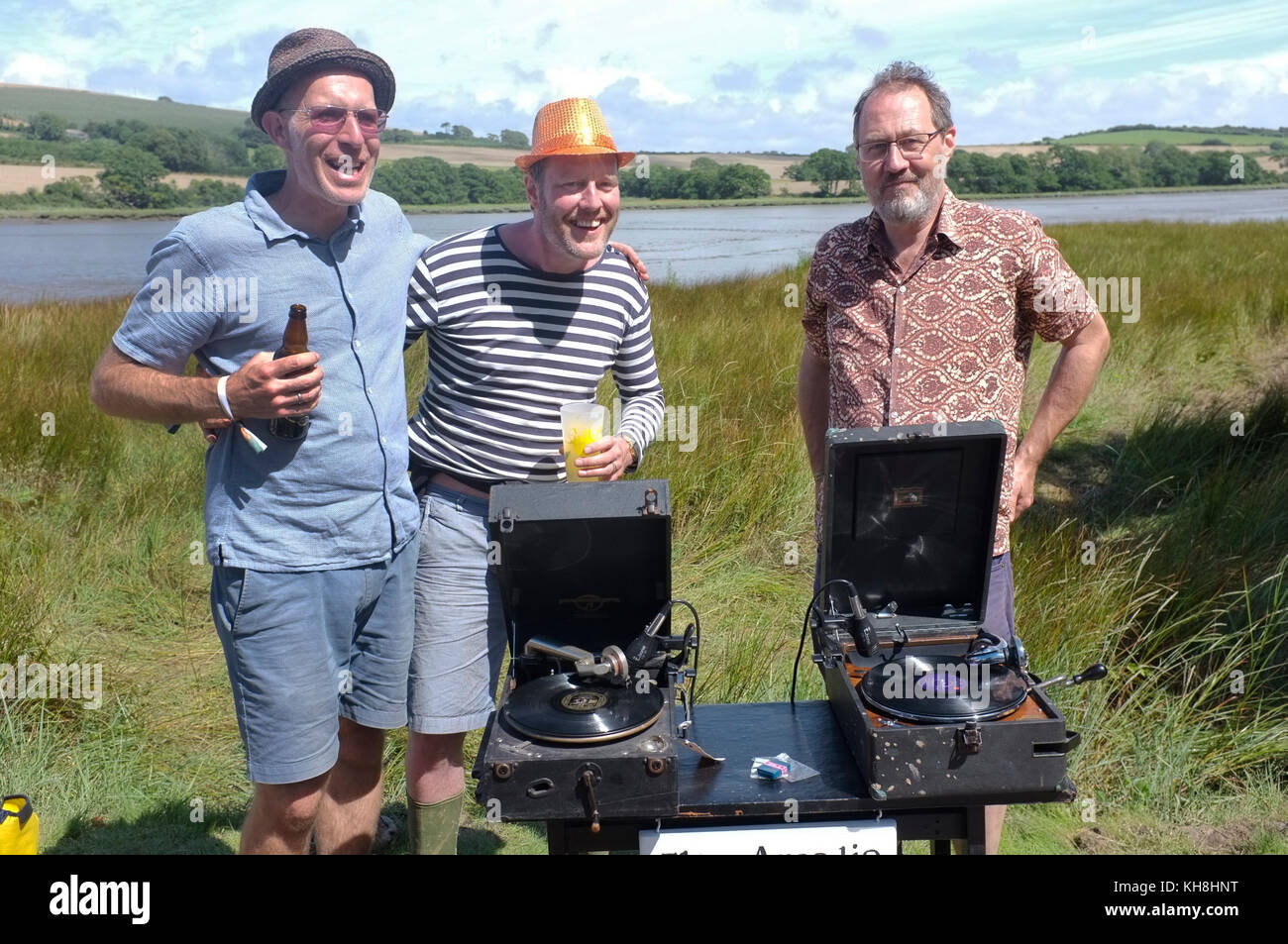 Three men wo play old 78 gramophone records. Stock Photo