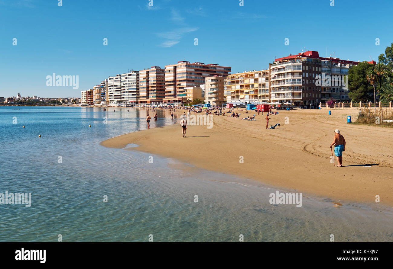 Torrevieja, Spain - October 20, 2017: Acequion beach in the Torrevieja resort city. Torrevieja is a Mediterranean city, popular travel destination for Stock Photo
