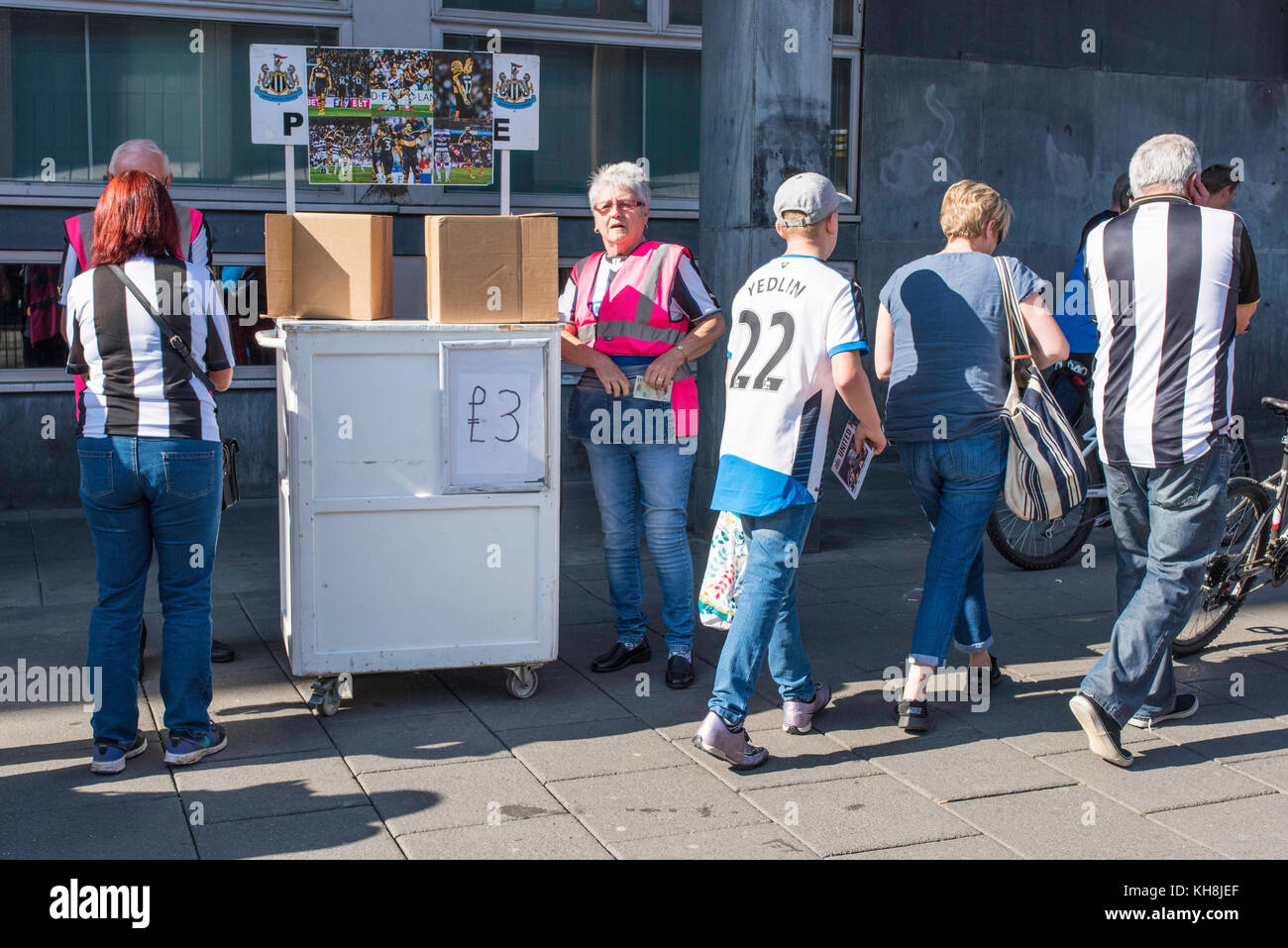 Selling programmes before the match outside Newcastle's St James ...