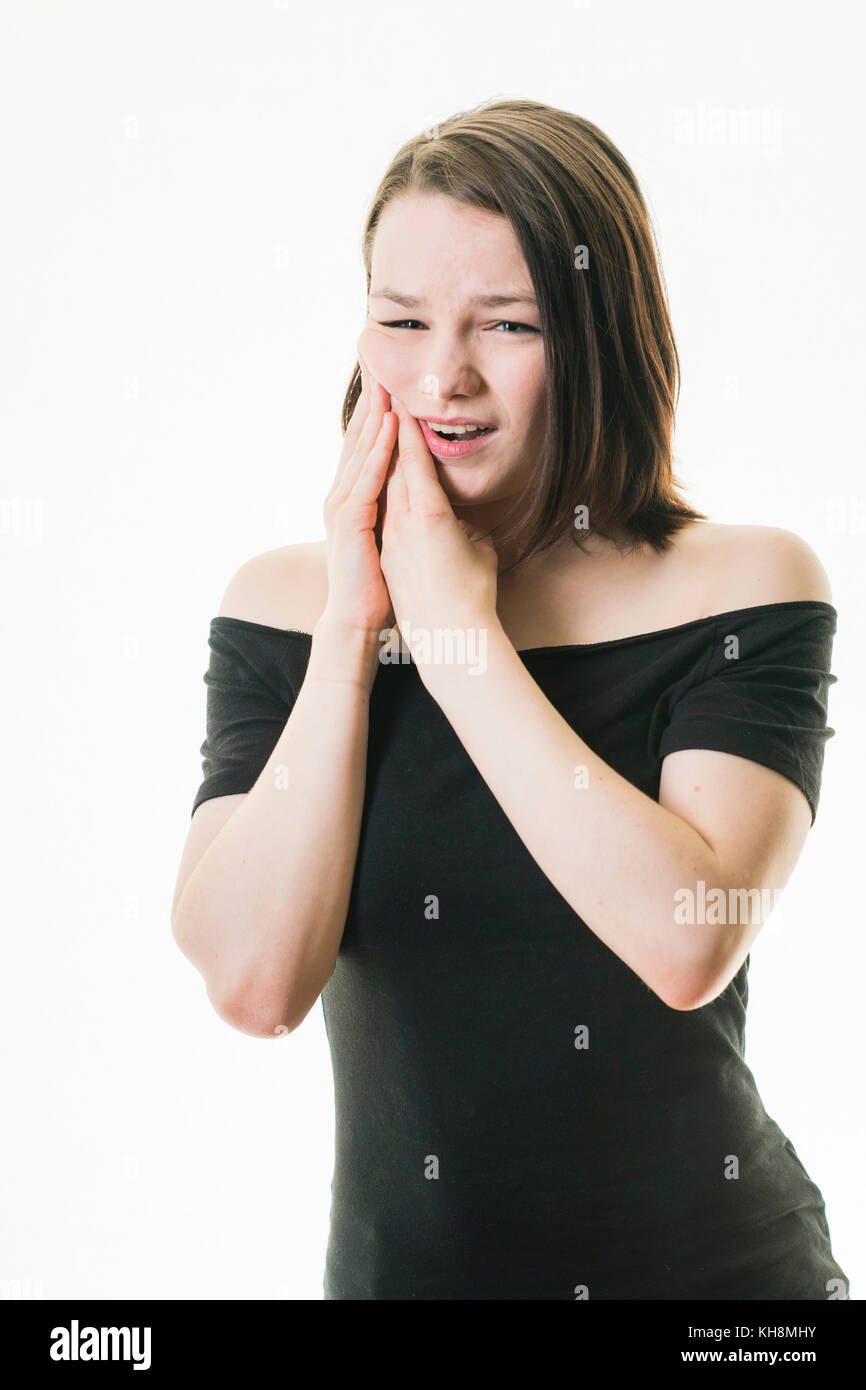 Tooth decay and gum disease in the UK A young brown haired caucasian