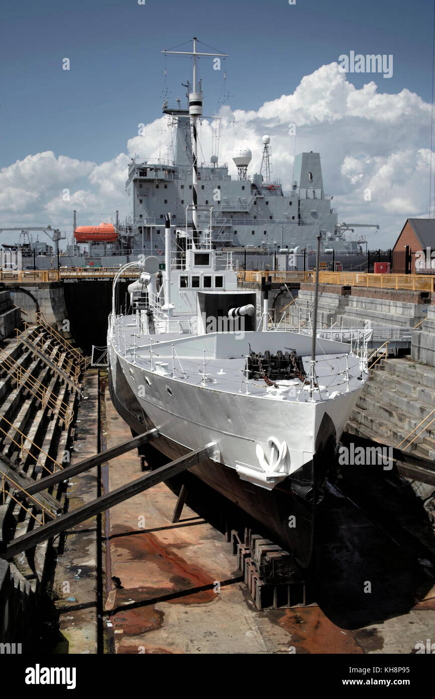 AJAXNETPHOTO. 15TH JUNE, 2009. PORTSMOUTH, ENGLAND. - M29 CLASS MONITOR, HMS M.33 IN SCHEDULED ANCIENT MONUMENT NO.1 DRY DOCK IN THE HISTORIC DOCKYARD. PHOTO:JONATHAN EASTLAND/AJAX REF:DP91506 49 Stock Photo