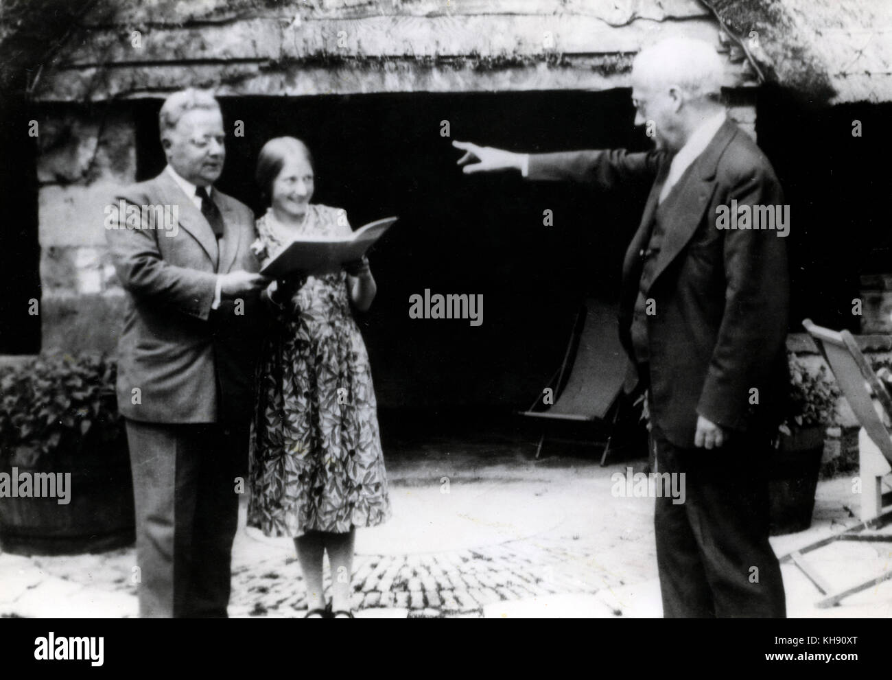 Gustav Holst possibly conducting daughter Imogen in duet with Emil (Ernest Cossart) on holiday in the Cotswolds in the summer of 1932. English composer, 21 September 1874 - 25 May 1934 Stock Photo