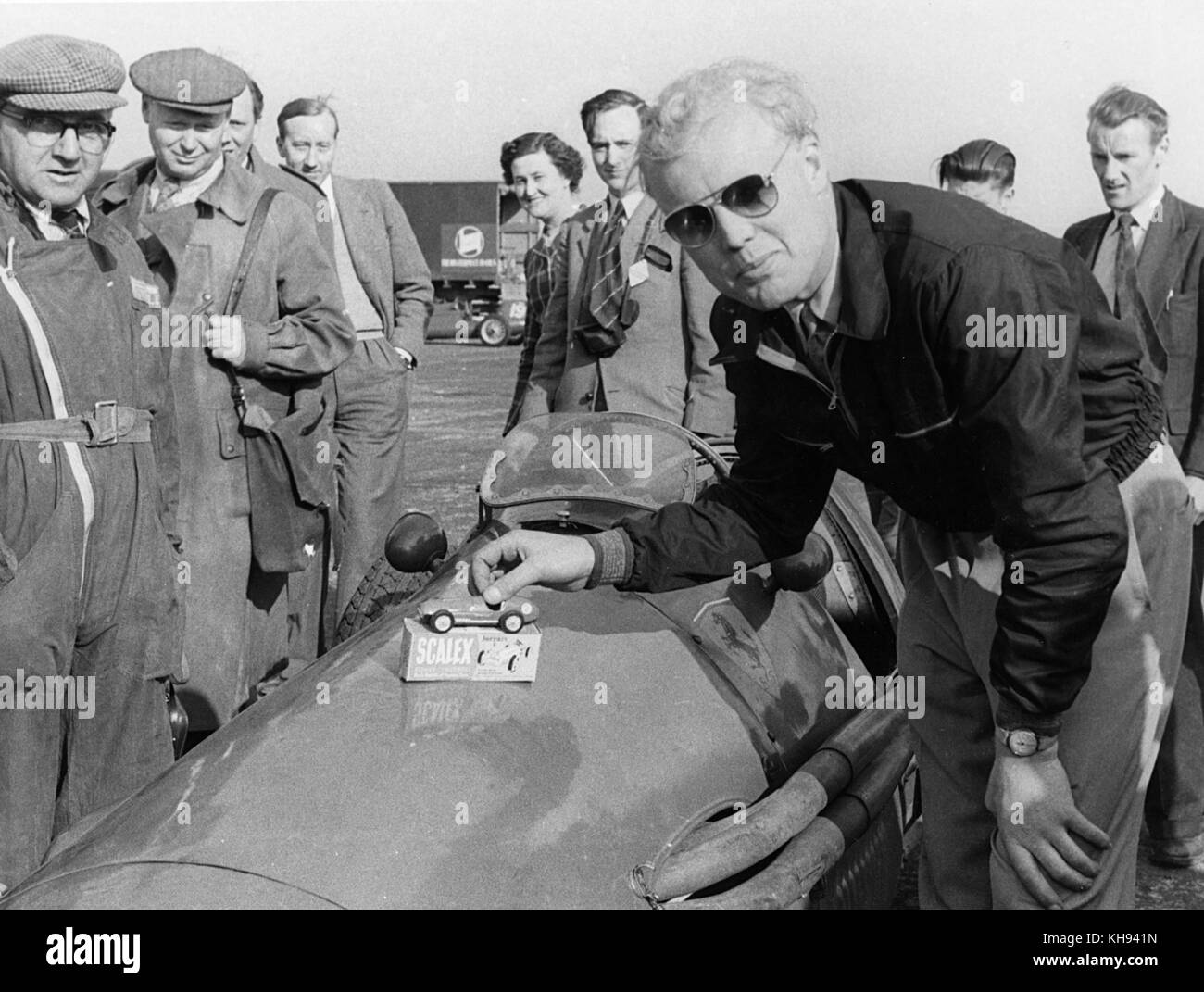 Mike Hawthorn with Scalextric model car Stock Photo