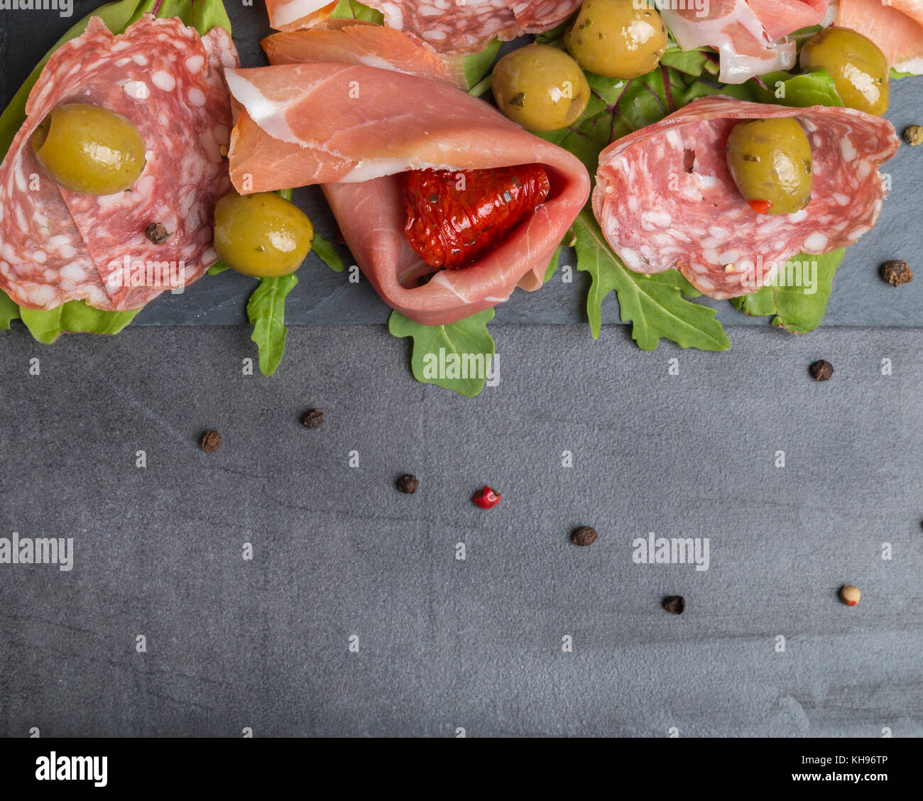 italian antipasto with dried tomatoes and olives top view Stock Photo