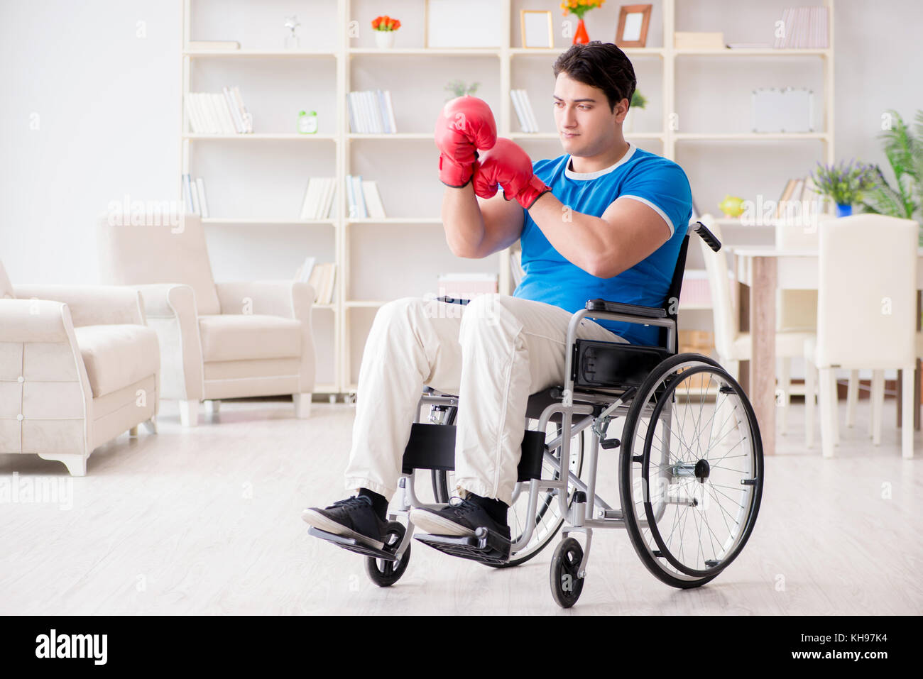 Disabled boxer at wheelchair recovering from injury Stock Photo Alamy