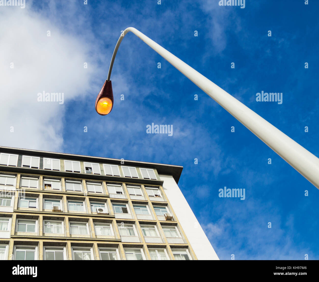Street lighting on during day Stock Photo Alamy