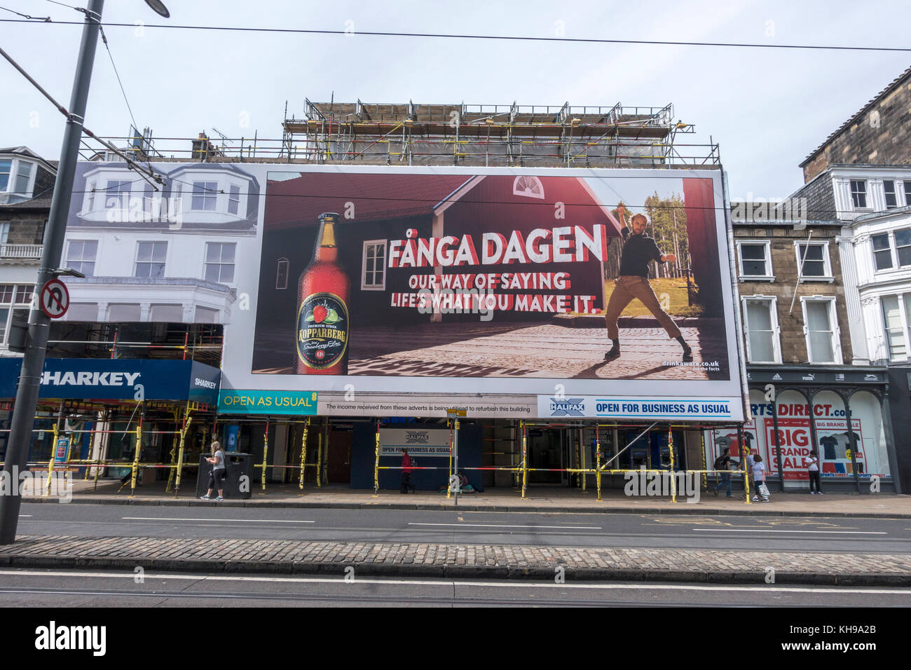 Large Advertising Billboard For Kopparberg Cider Covering Construction Scaffolding At The Halifax Building Society On Princes Street Edinburgh Scotlan Stock Photo