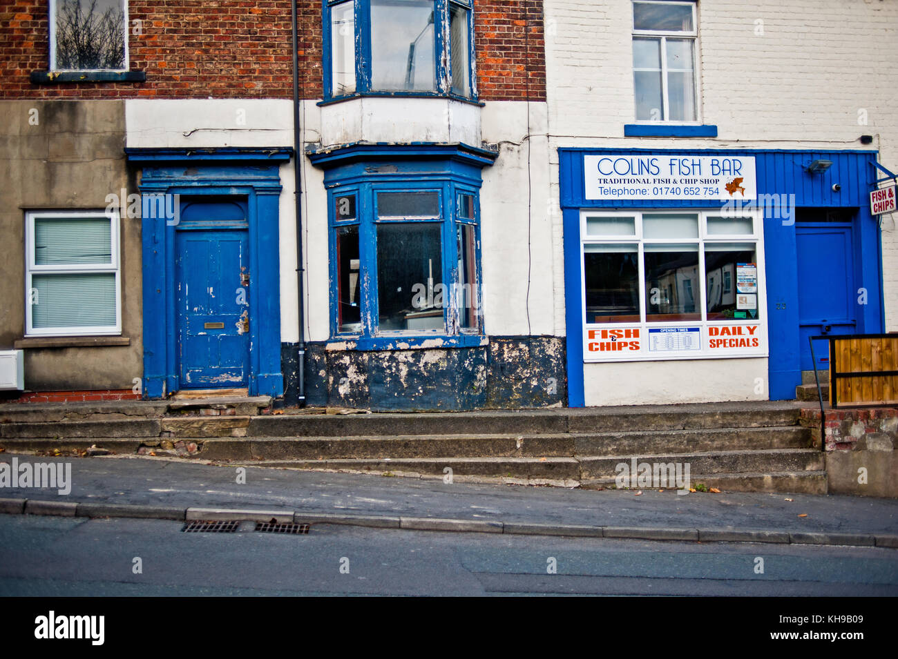 Rundown Terrace House and and Colins Fish Bar in Ferryhill, County Durham Stock Photo