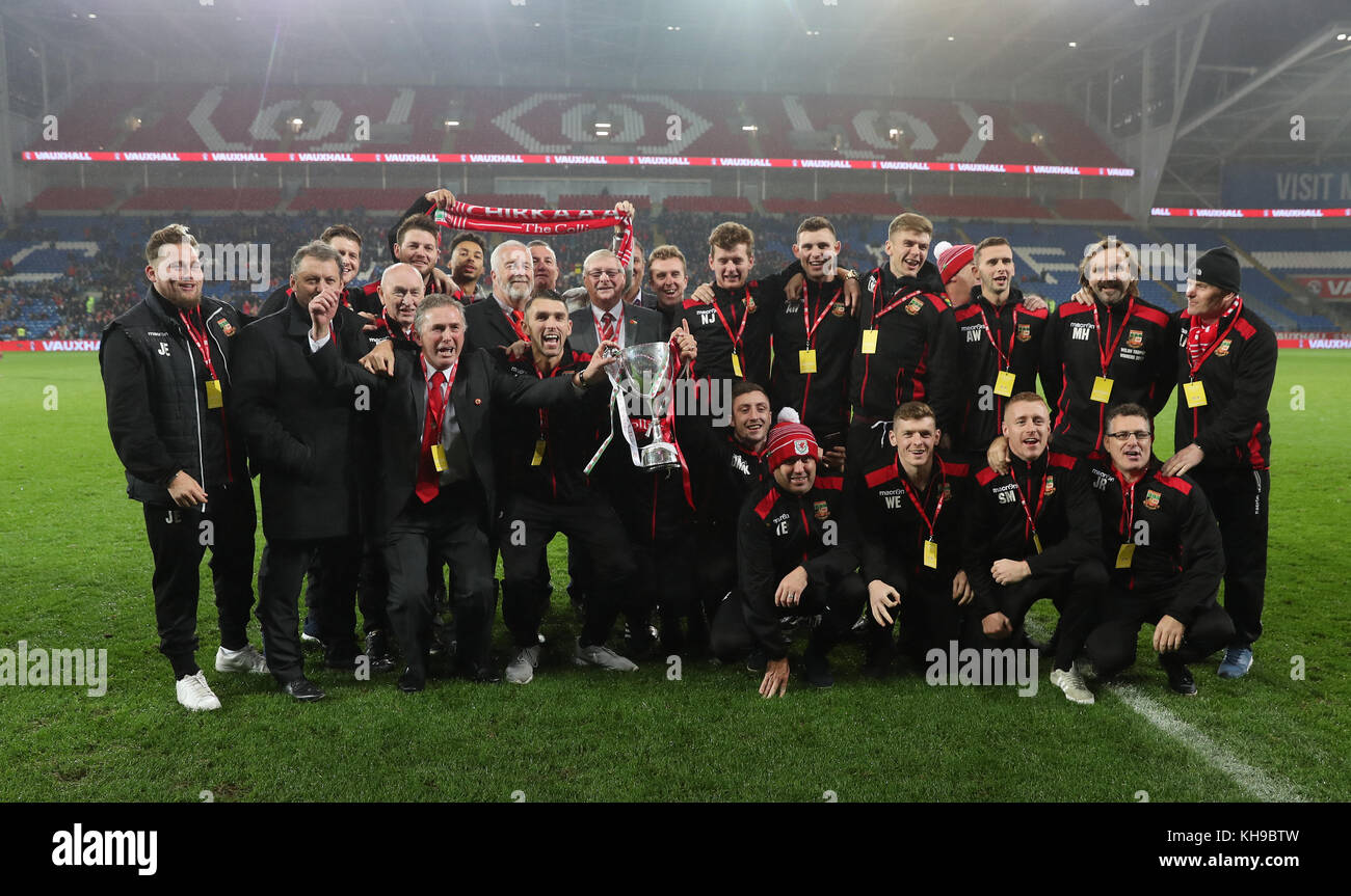 Chirk AAA receive the Welsh Trophy during the International Friendly match at the Cardiff City Stadium. Stock Photo