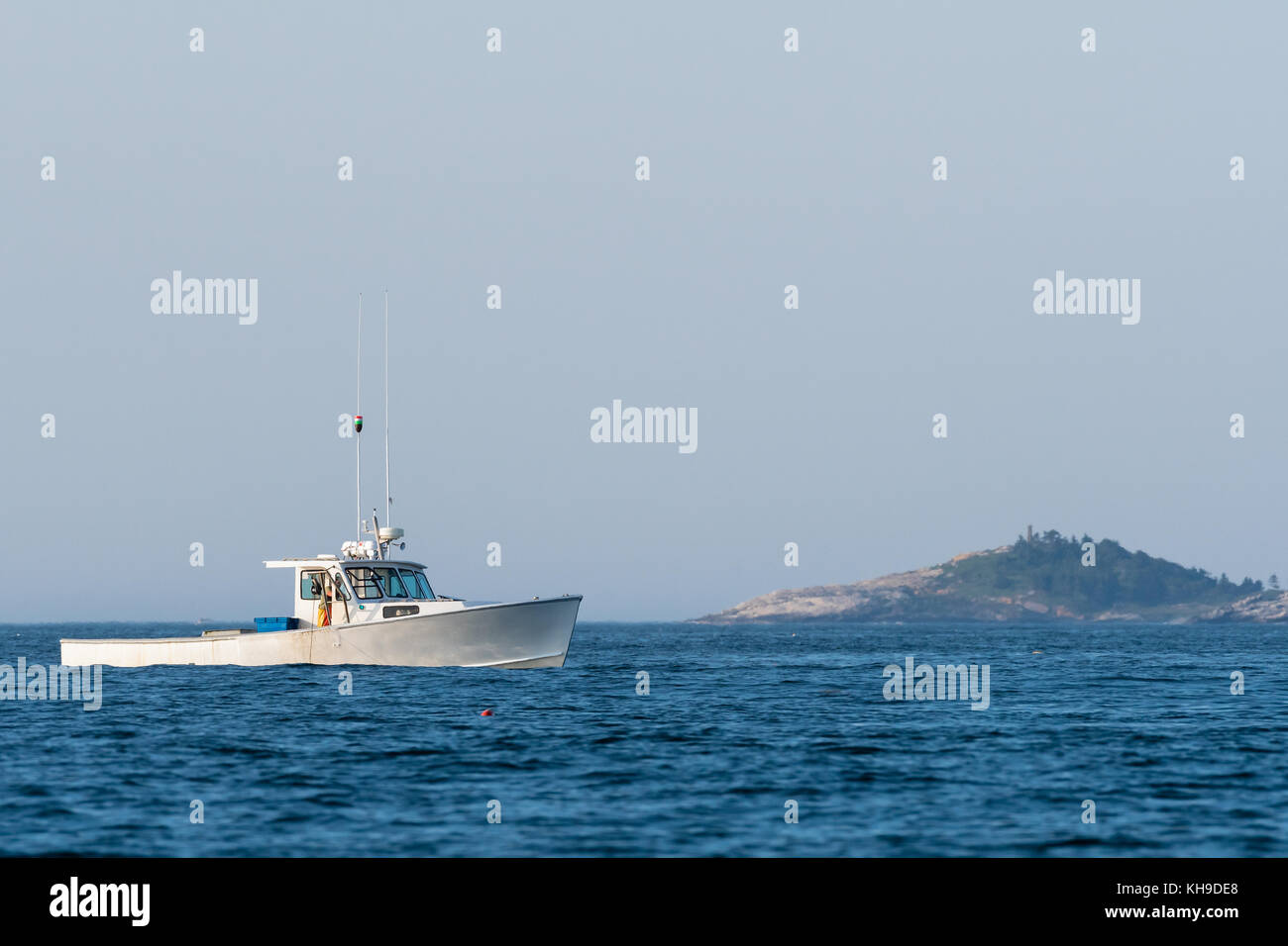 Lobster men hard at work on a beautiful morning in early autumn in