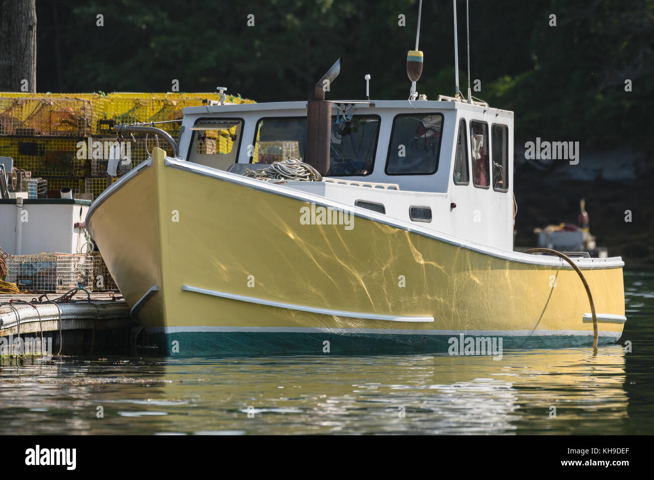 Lobster boat docked in early autumn in South Bristol, Maine, United
