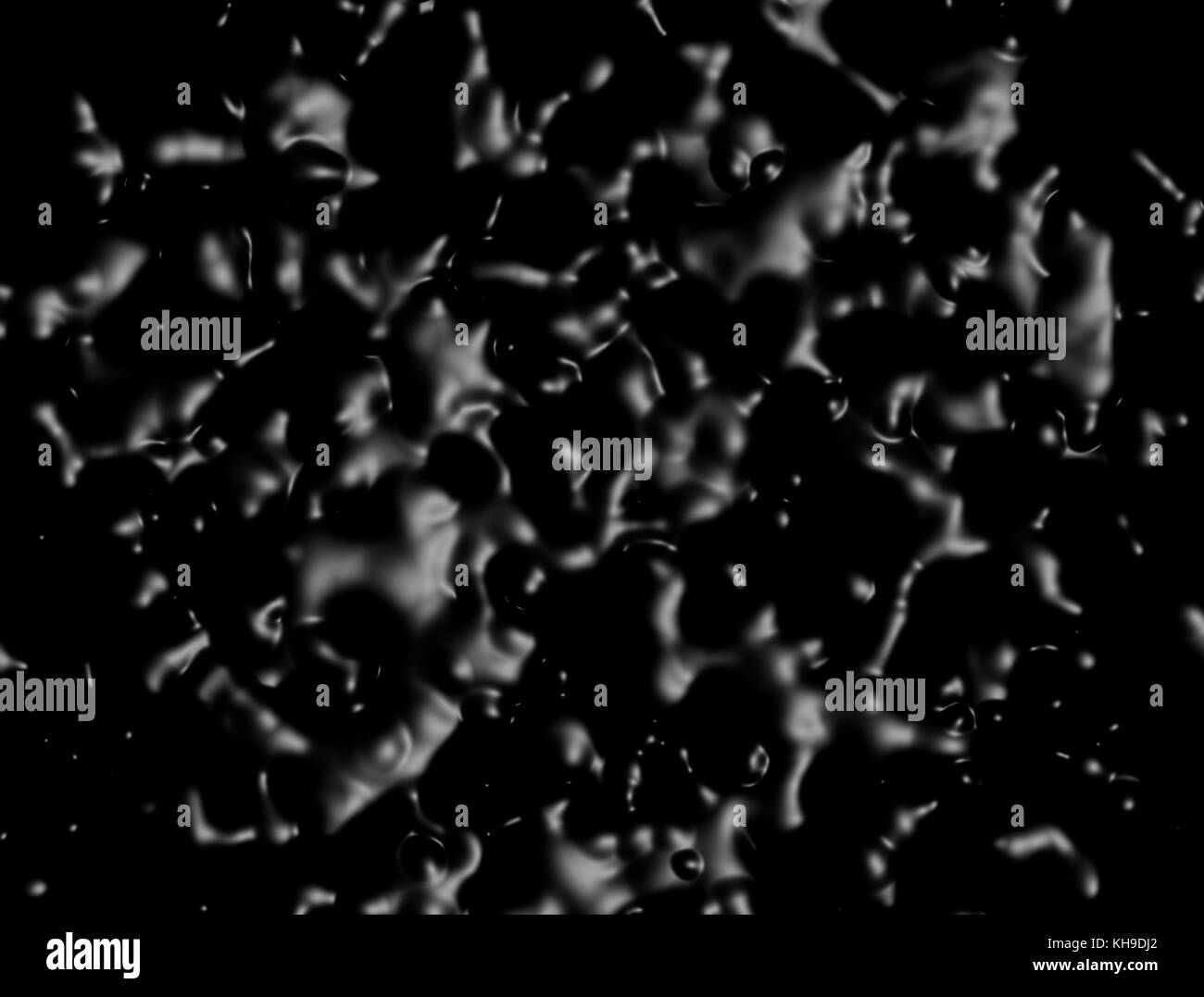 black bubbles oil to spread liquid paint on a black background Stock Photo