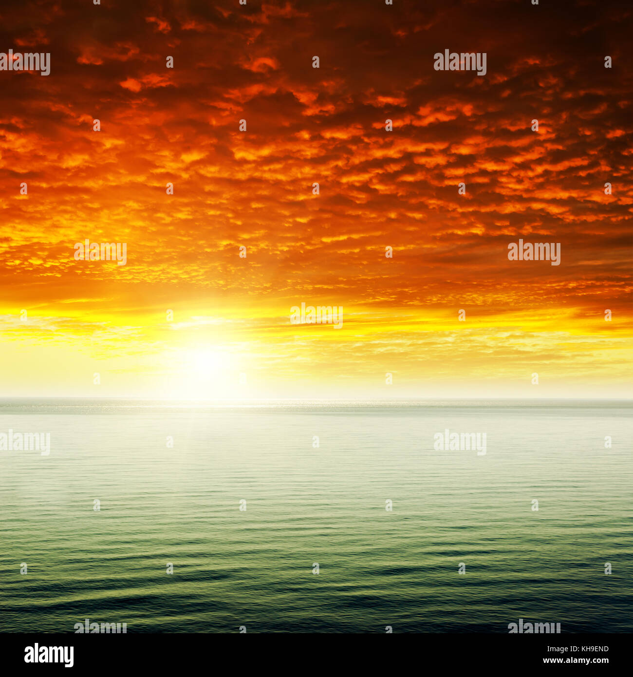 sky and red dramatic sunset over sea Stock Photo - Alamy