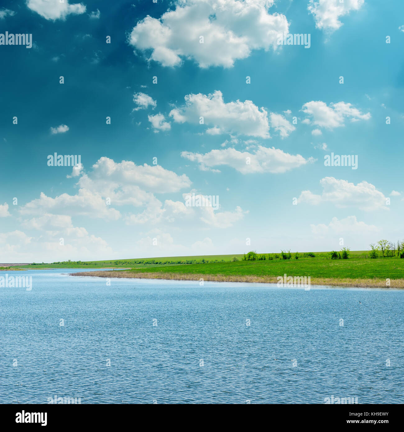 summer landscape with river and cloudy sky Stock Photo - Alamy