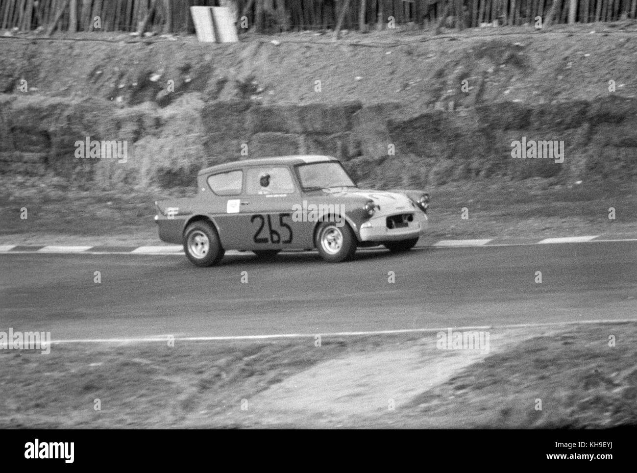 A Ford Anglia, race number 265, being driven in a race at the Brands Hatch circuit in England in 1968. Stock Photo