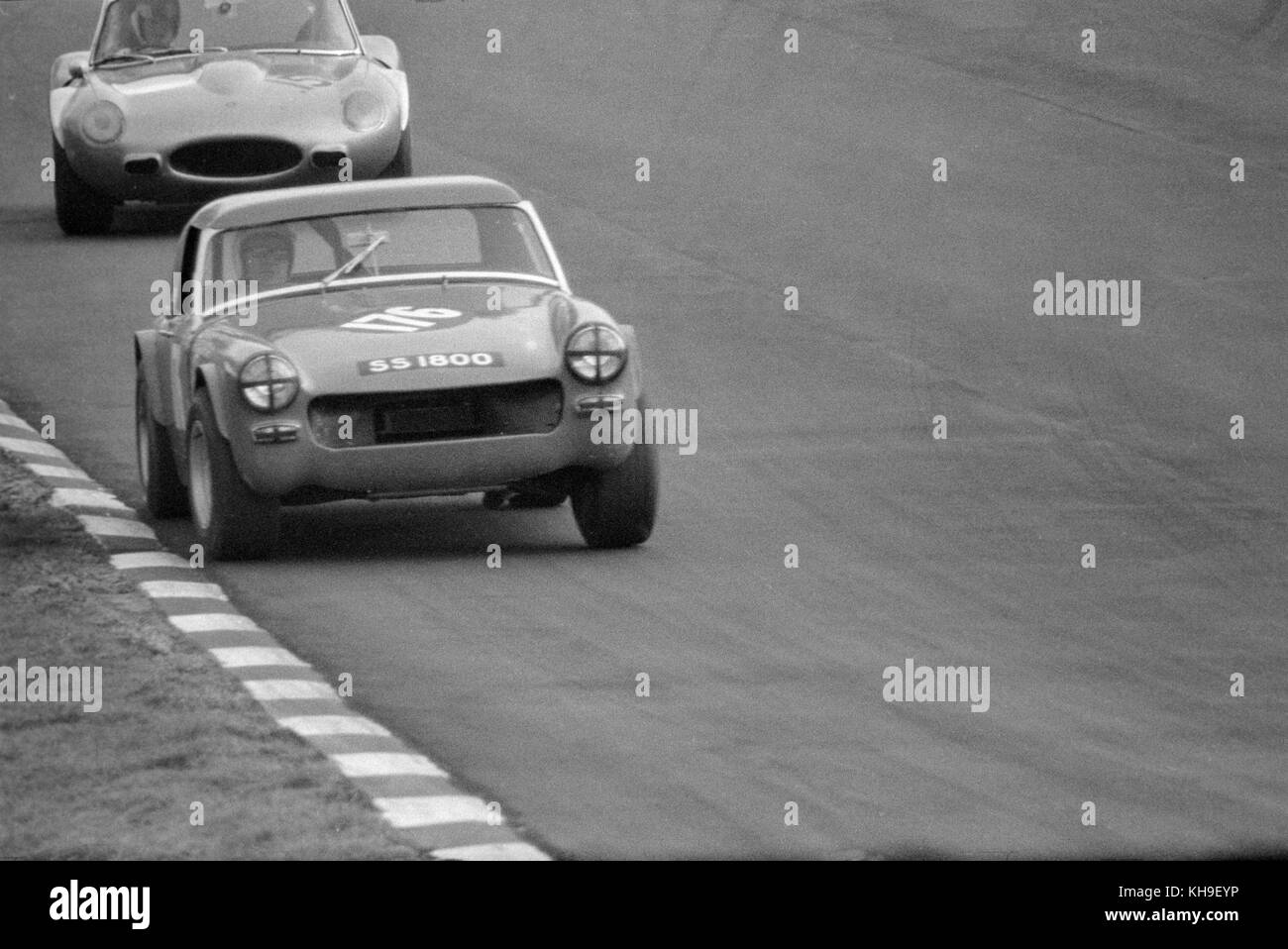 Racing at Brands Hatch in England in 1968, showing an MGB and a Jaguar E-Type. Stock Photo