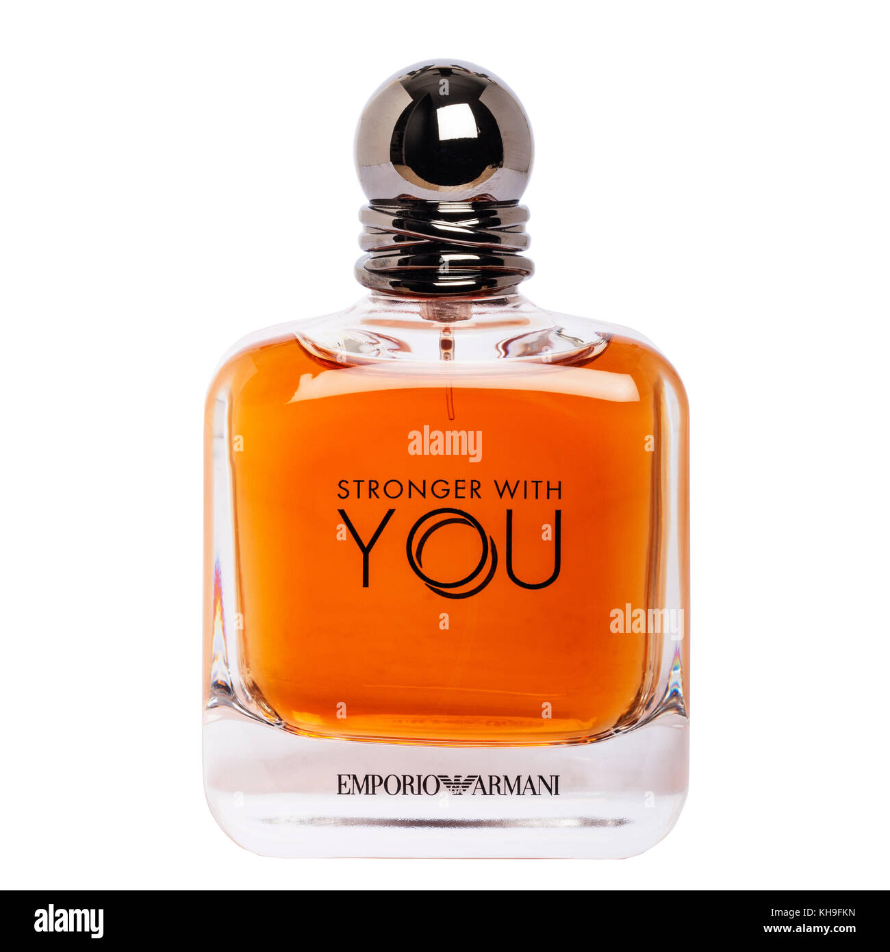 A bottle of designer mens aftershave,stronger with you by Emporio Armani on a white background Stock Photo