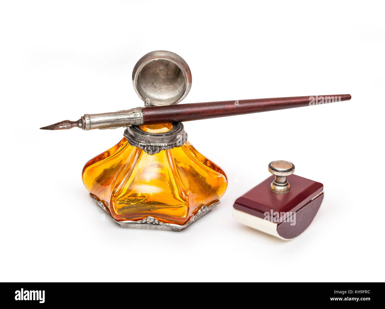 Vintage fountain pen and inkwell isolated on a white background with clipping path Stock Photo
