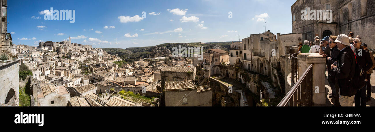 Matera, Italy, April 21, 2015: Tourists visiting stone town April 21, 2015 One of the tourist attractions in Matera; World Heritage in Basilicata, Ita Stock Photo