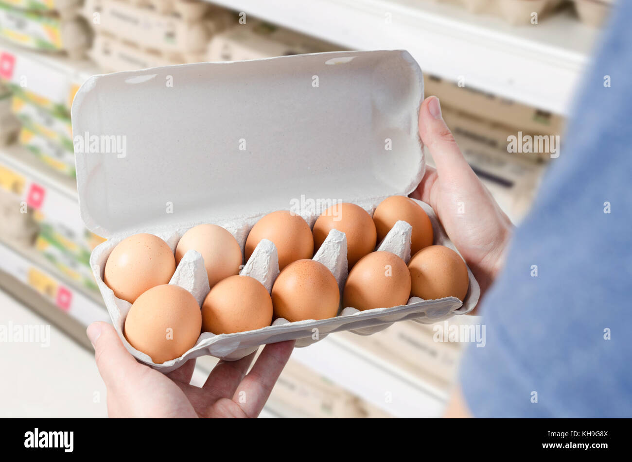Man buys eggs in the supermarket. Egg store supermarket price expensive grocery shop concept